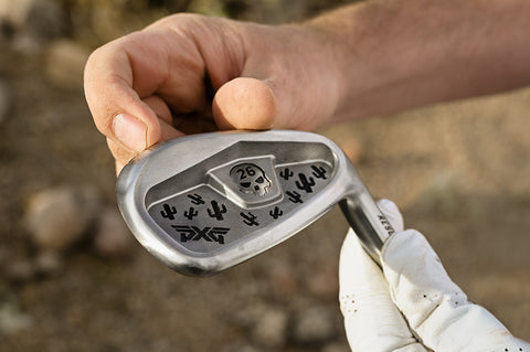 Desert Club with a gloved hand